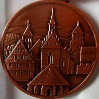 zep_medal_2.jpg.4651613a3b0fb547c919634b4a9cf4bb.jpg