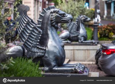 depositphotos_154455040-stock-photo-griffin-statue-of-iranian-antique.jpg