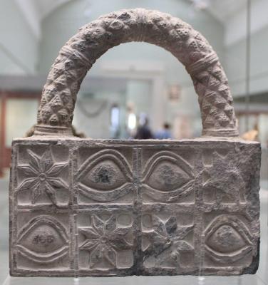 Carved_stone_with_integral_handle_BM_91700.jpg