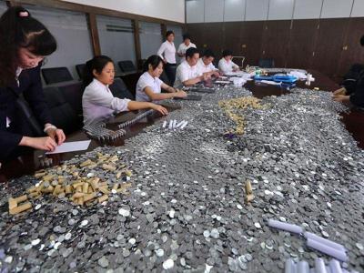 11000_dollars_equivalent_in_coins.jpg