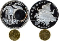 Либерия-в монету вставлена 10 евроцентов Германии
